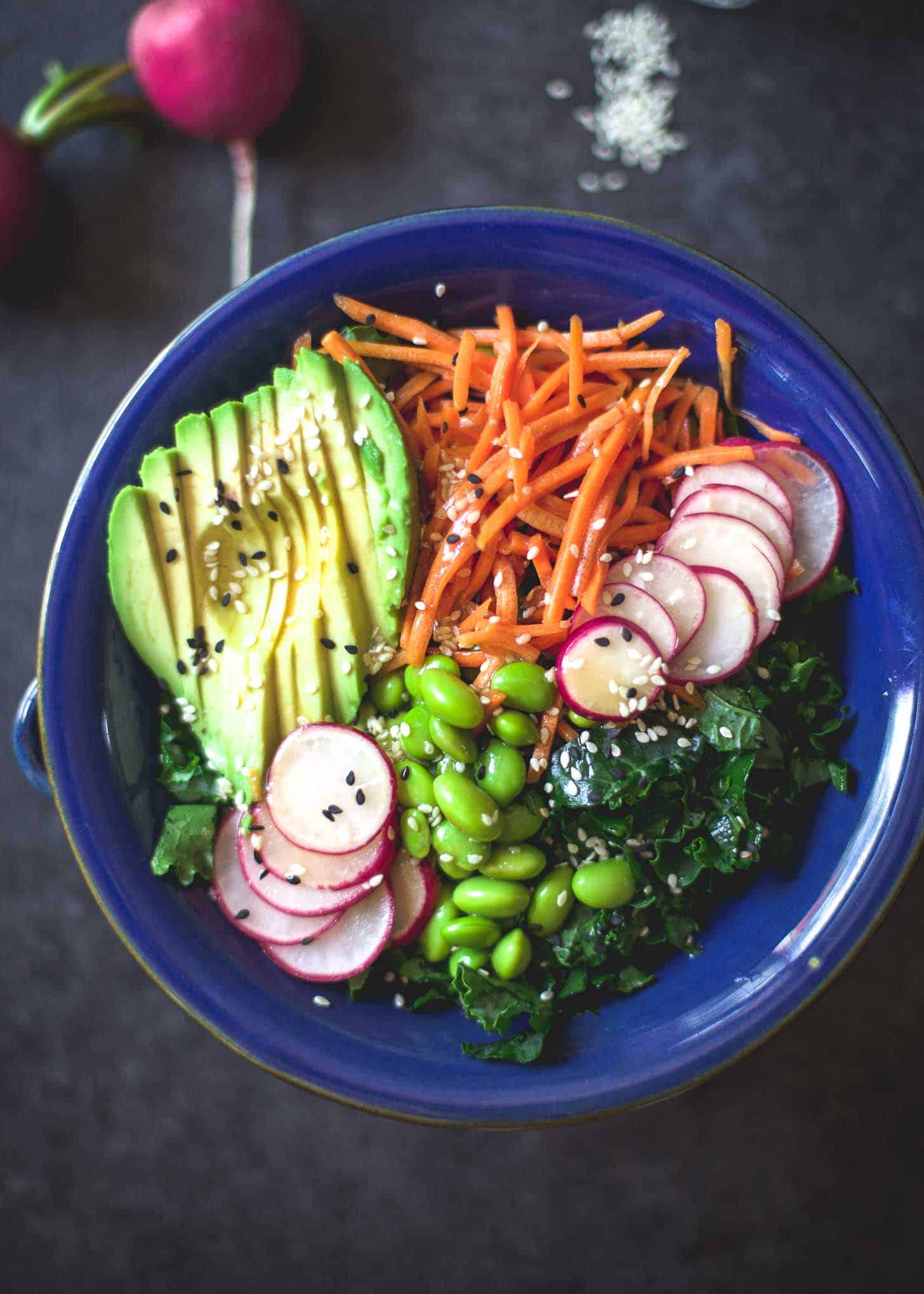 kale salad in a blue bowl