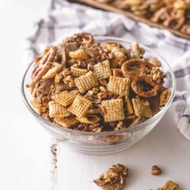 snack mix in a clear glass bowl