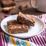 Chocolate Peanut Butter Oat Bars on a white plate