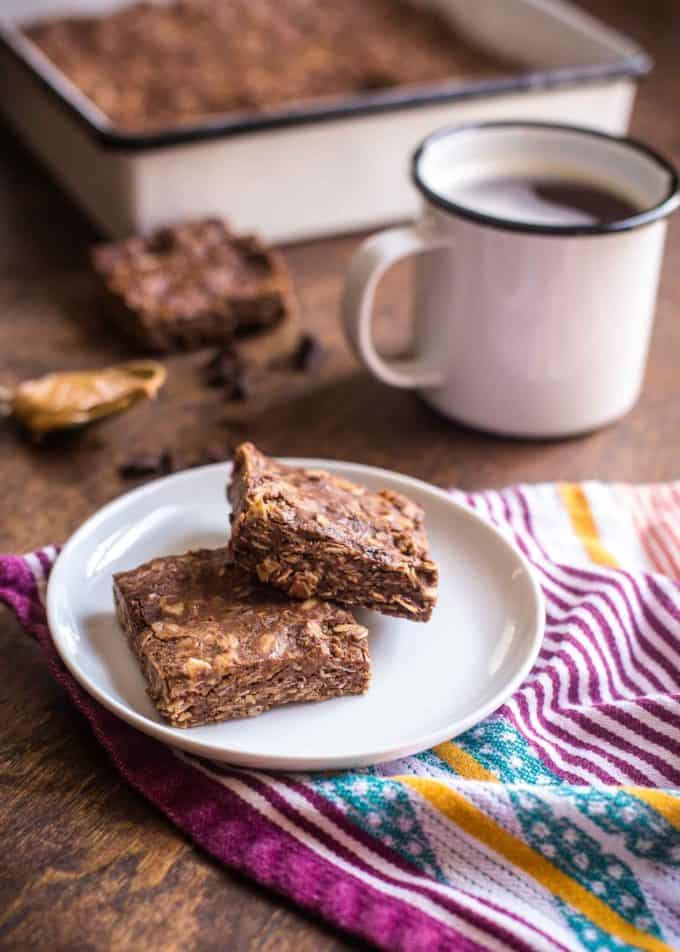 Chocolate Peanut Butter Oat Bars with a cup of coffee