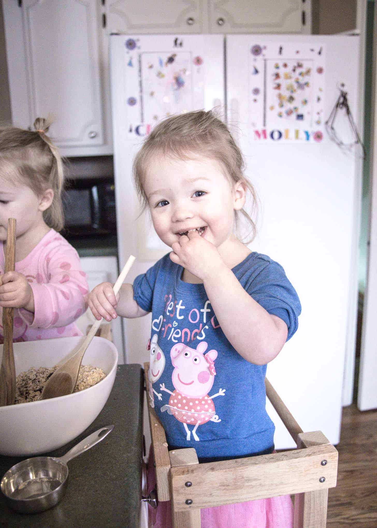 Molly and Clara baking Chocolate Oat Bars 