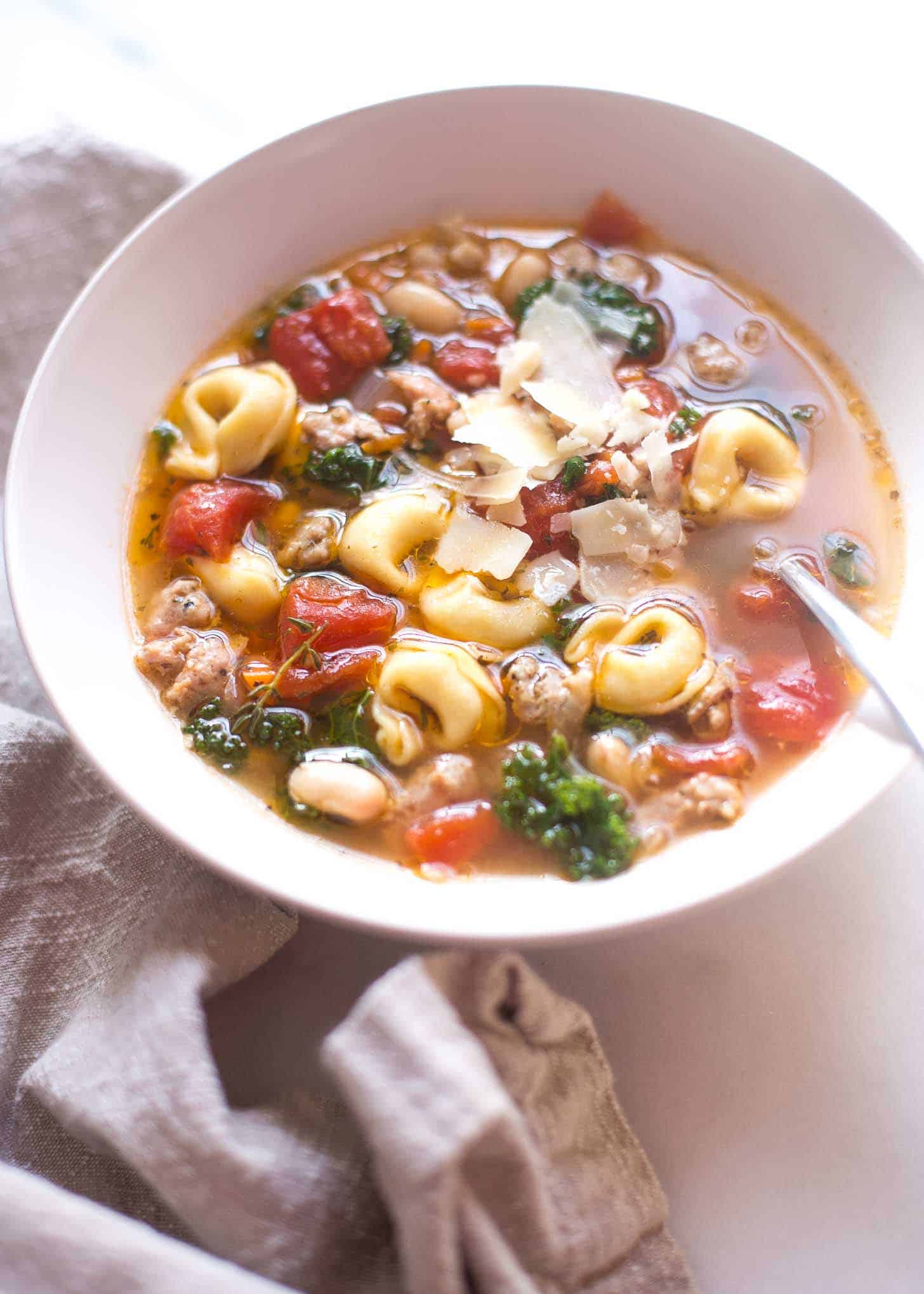 a bowl of Italian soup on a white table