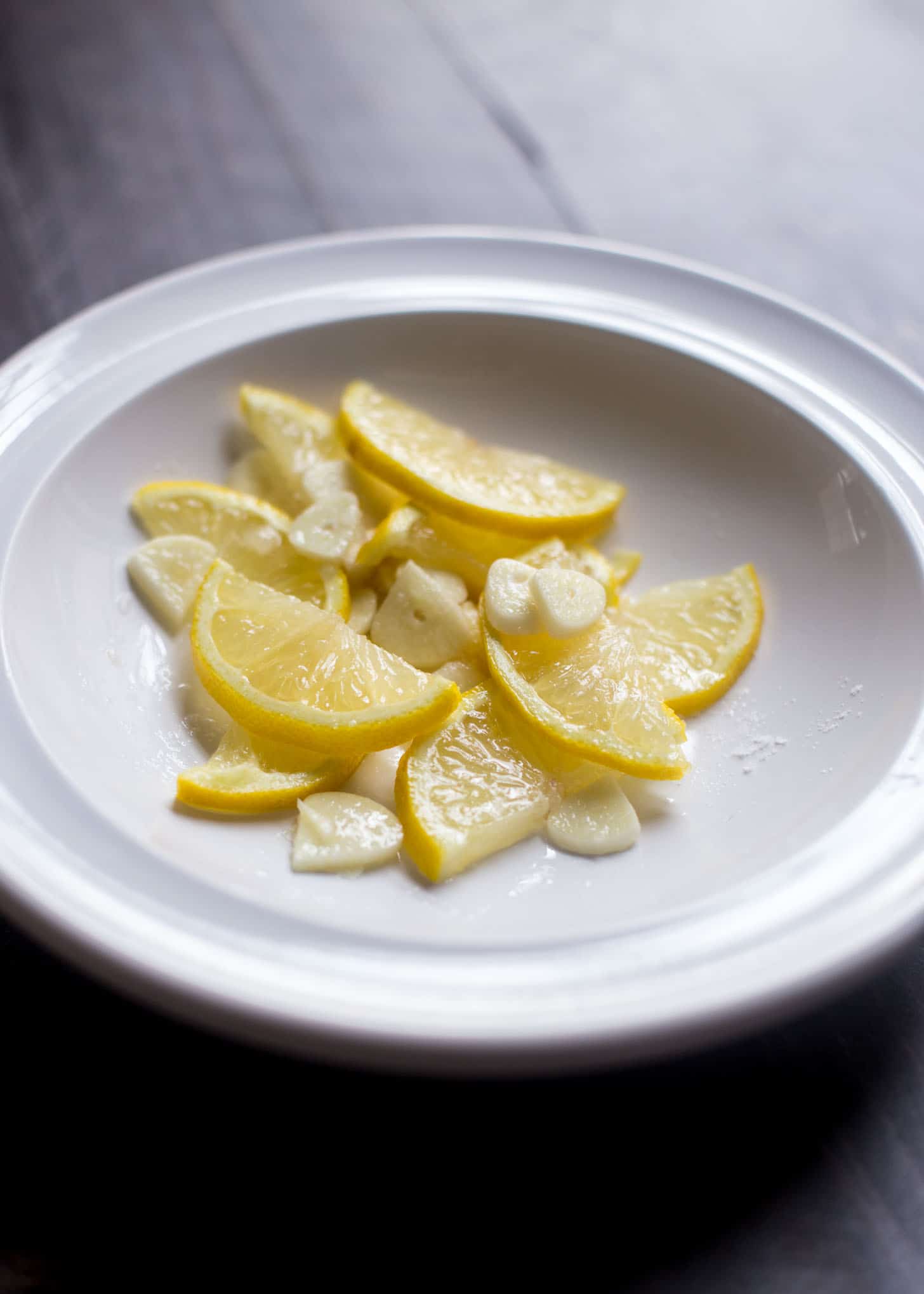 Charred Lemons in a white bowl