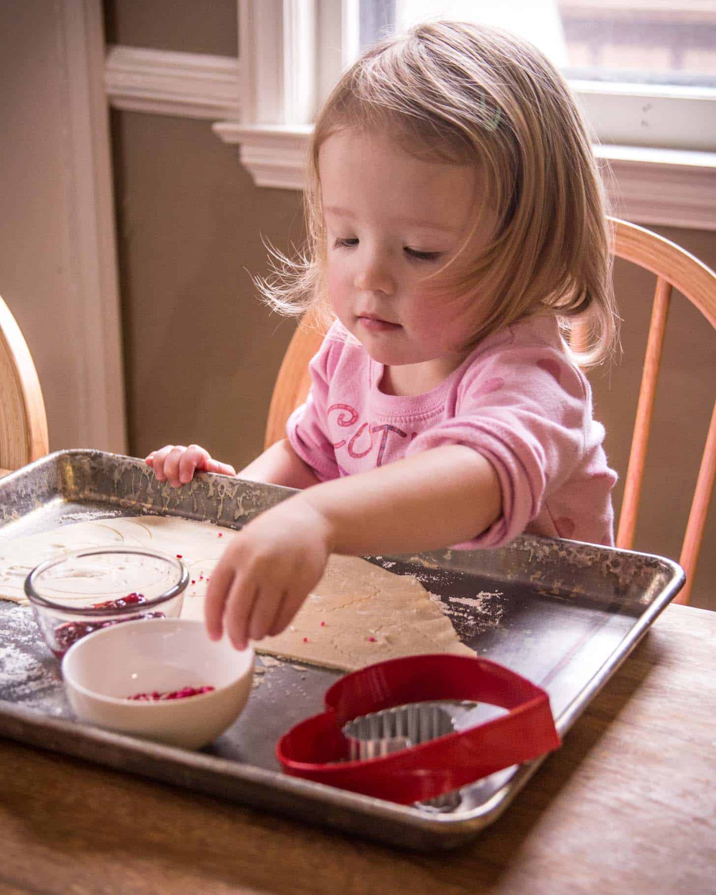 Clara baking Strawberry Nutella Hand Pies