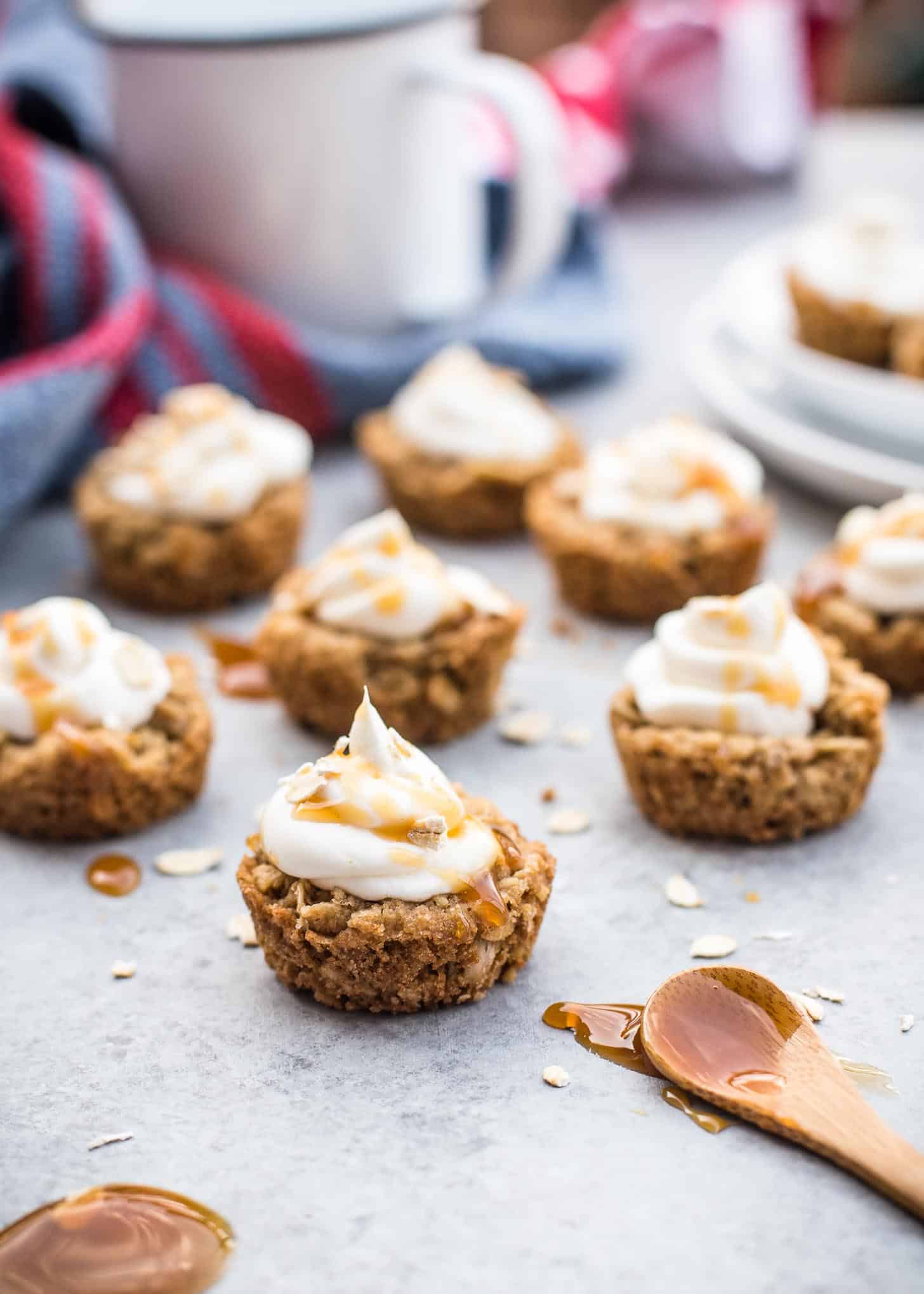 oatmeal cookie cups topped with whipped cream on a tabletop