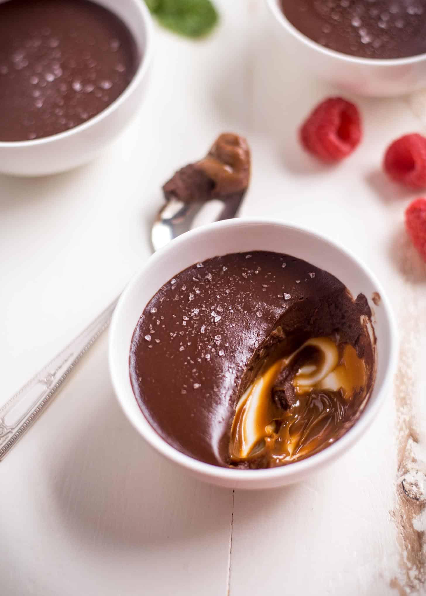 a white ramekin with chocolate cream