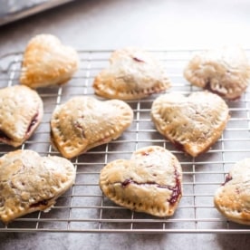 strawberry hand pies on a cooling rack