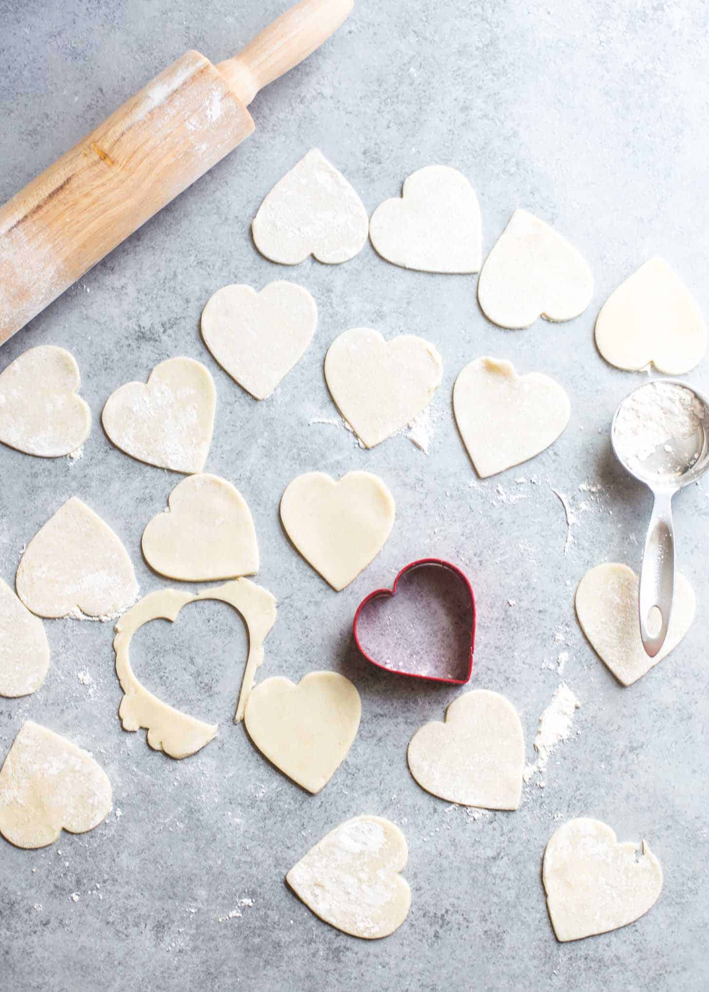 cutting out heart shapes from dough