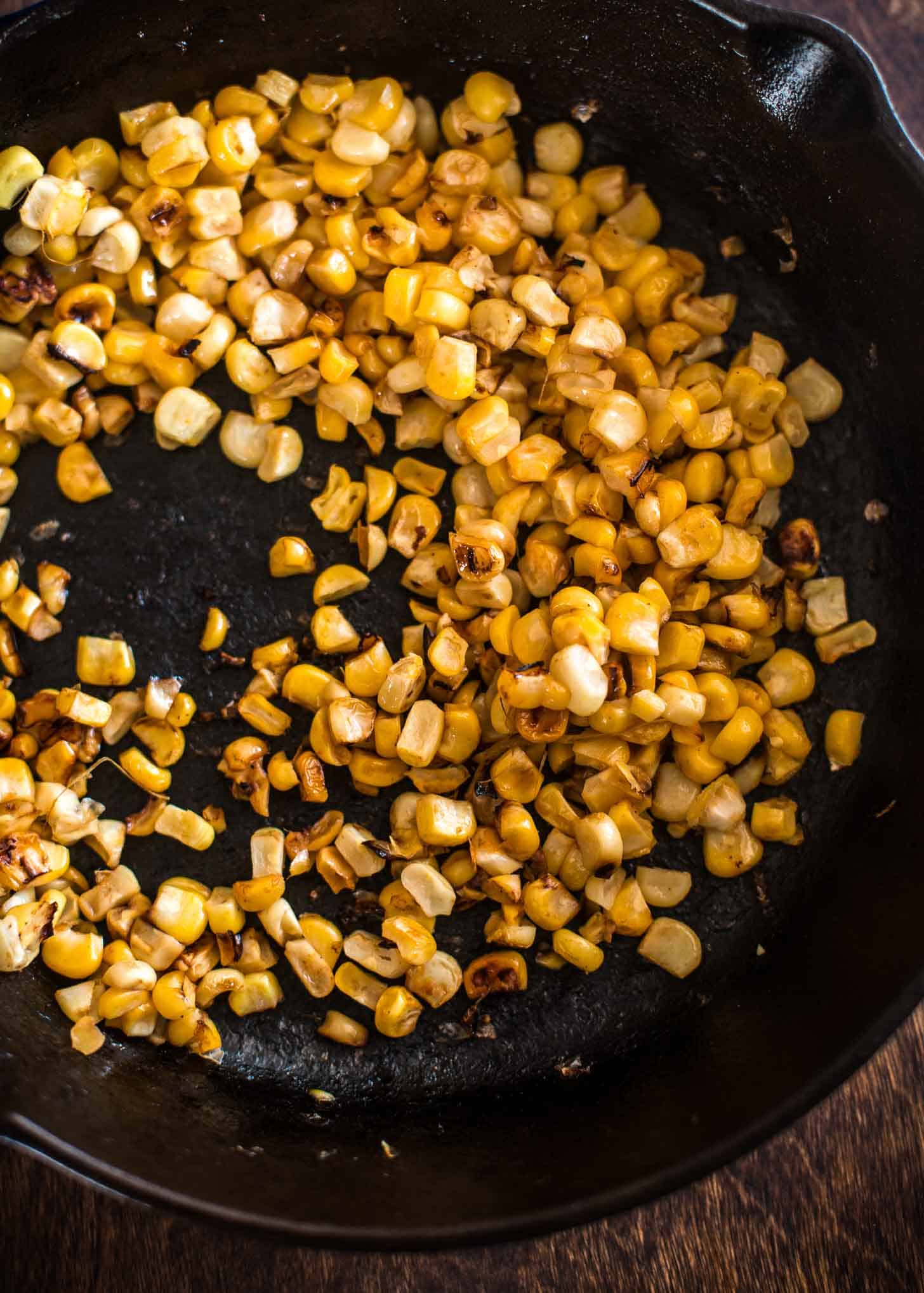 Charred Corn in a cast iron skillet