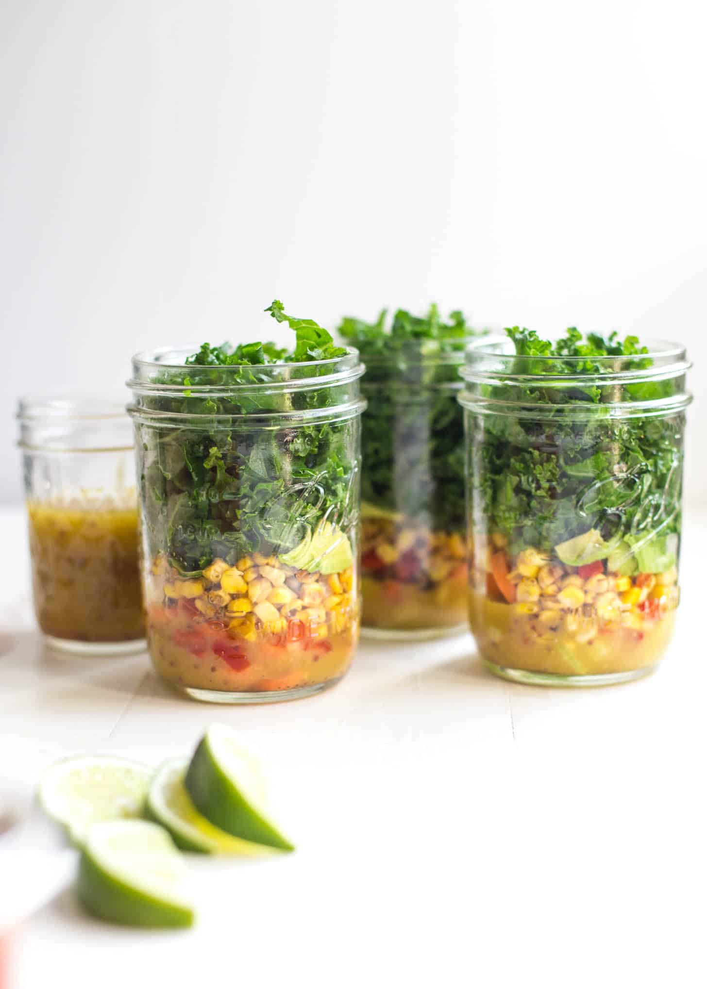 salads prepped in glass jars 