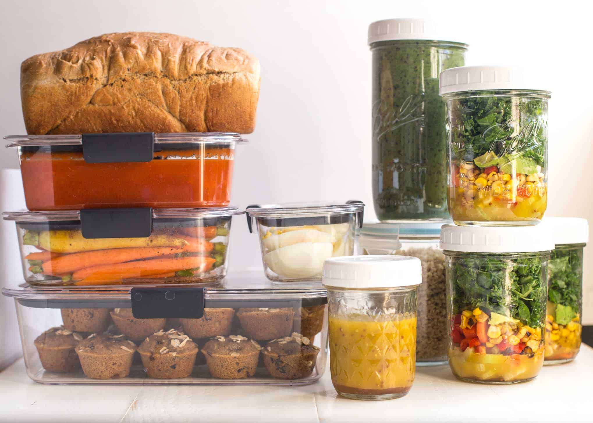 meals prepped in containers on a white table