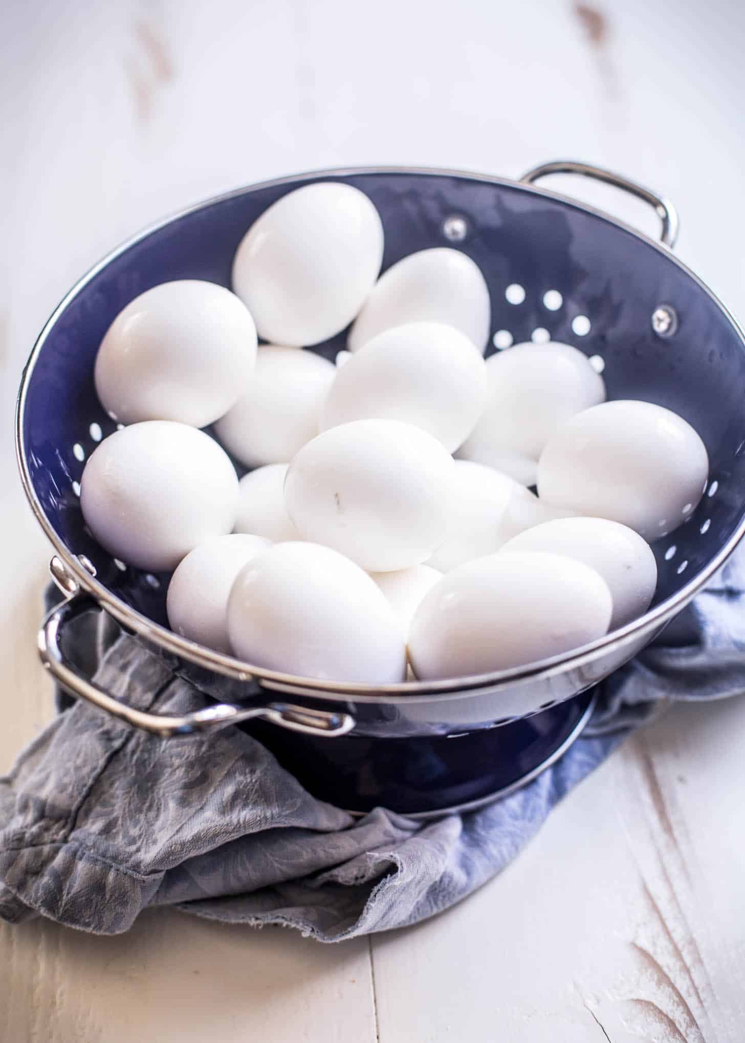 eggs in a blue colander