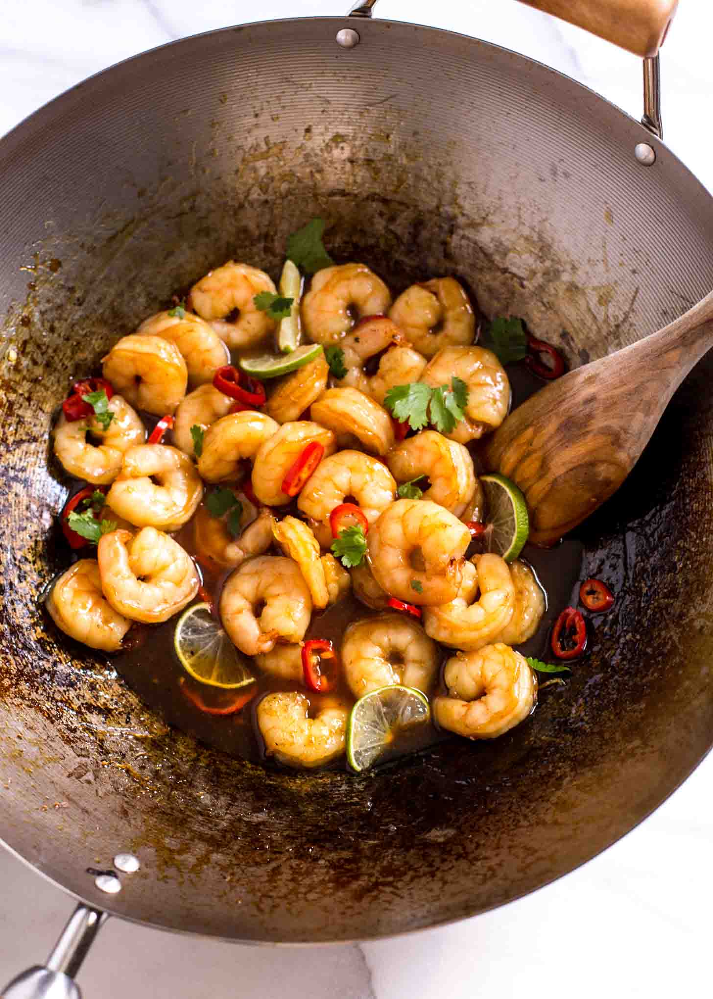 cooking shrimp in a wok