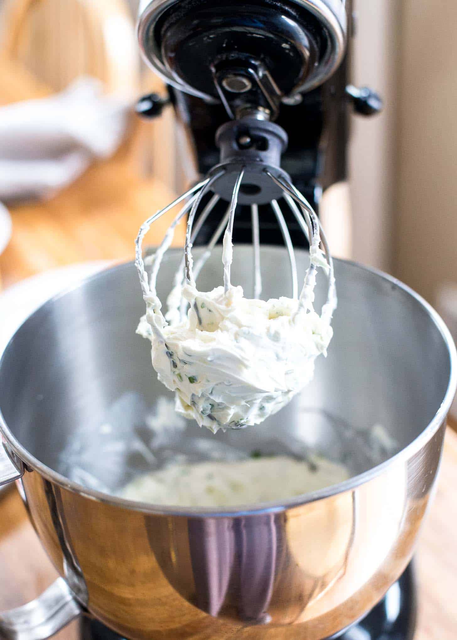 Whipped Scallion Cream Cheese in a stand mixer