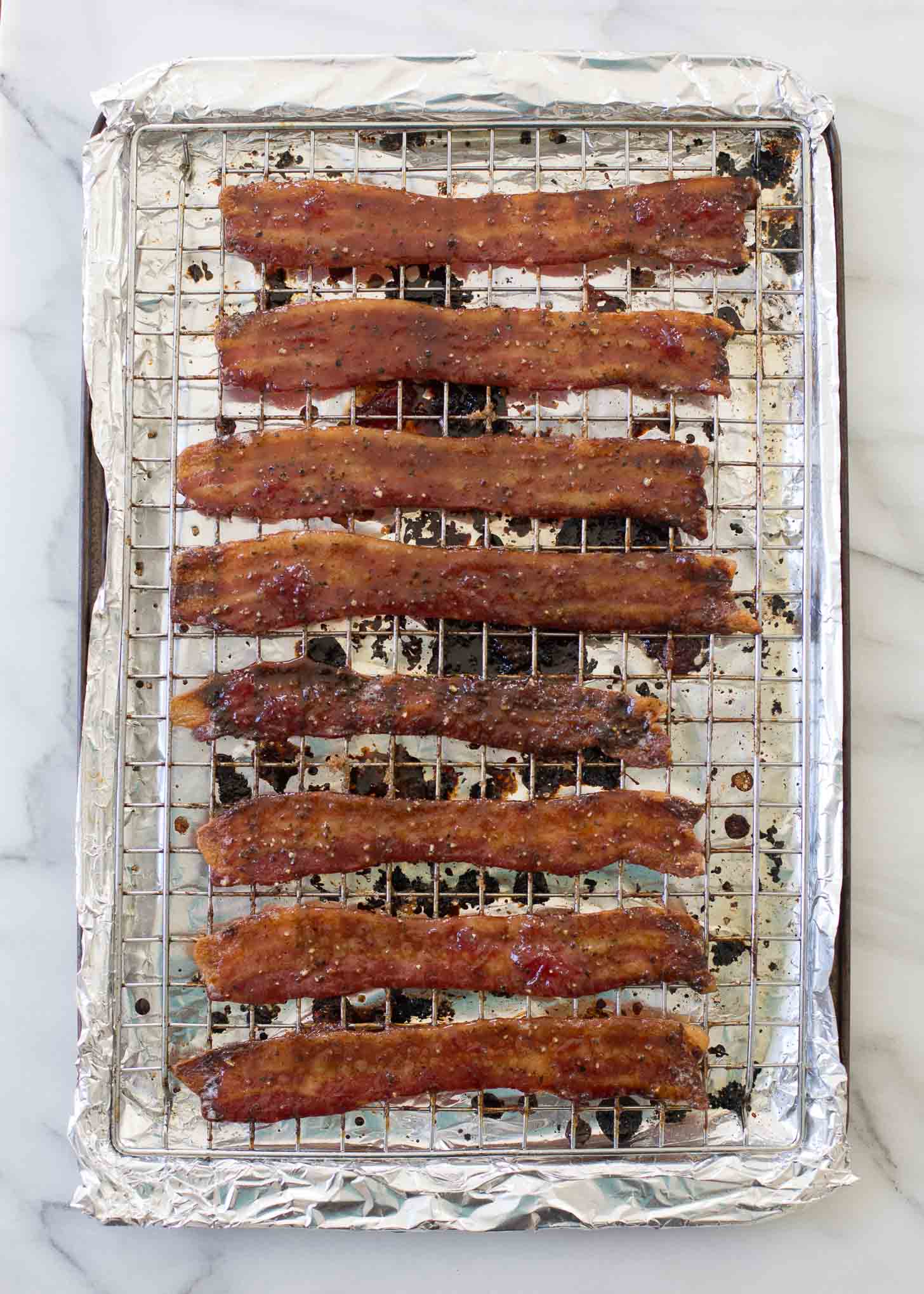 Strawberry Glazed Bacon on a wire rack