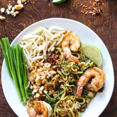 pad thai with zucchini noodles on a white plate