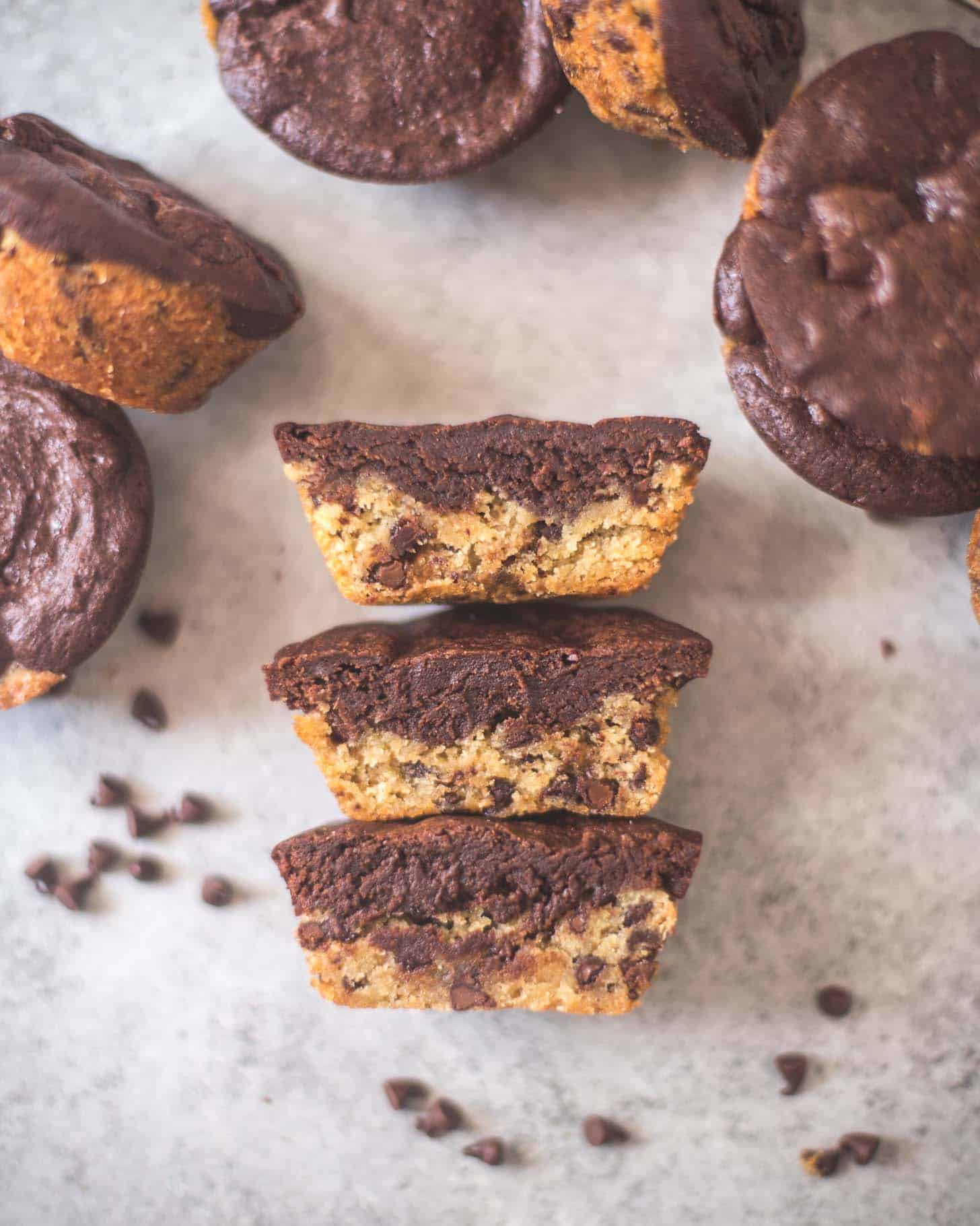 overhead image of Thick and Chewy Chocolate Chip Cookie Brownies stacked on a table