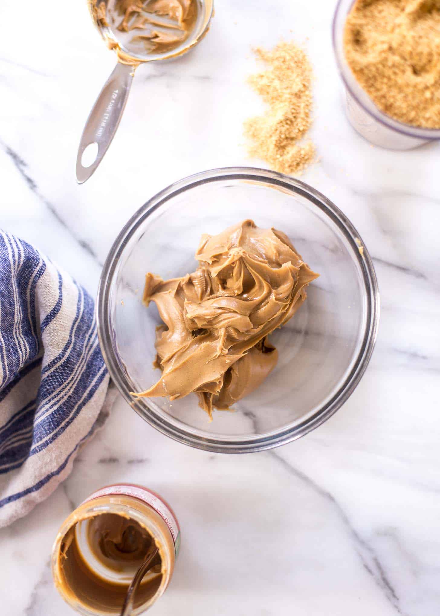 peanut butter in a clear glass bowl