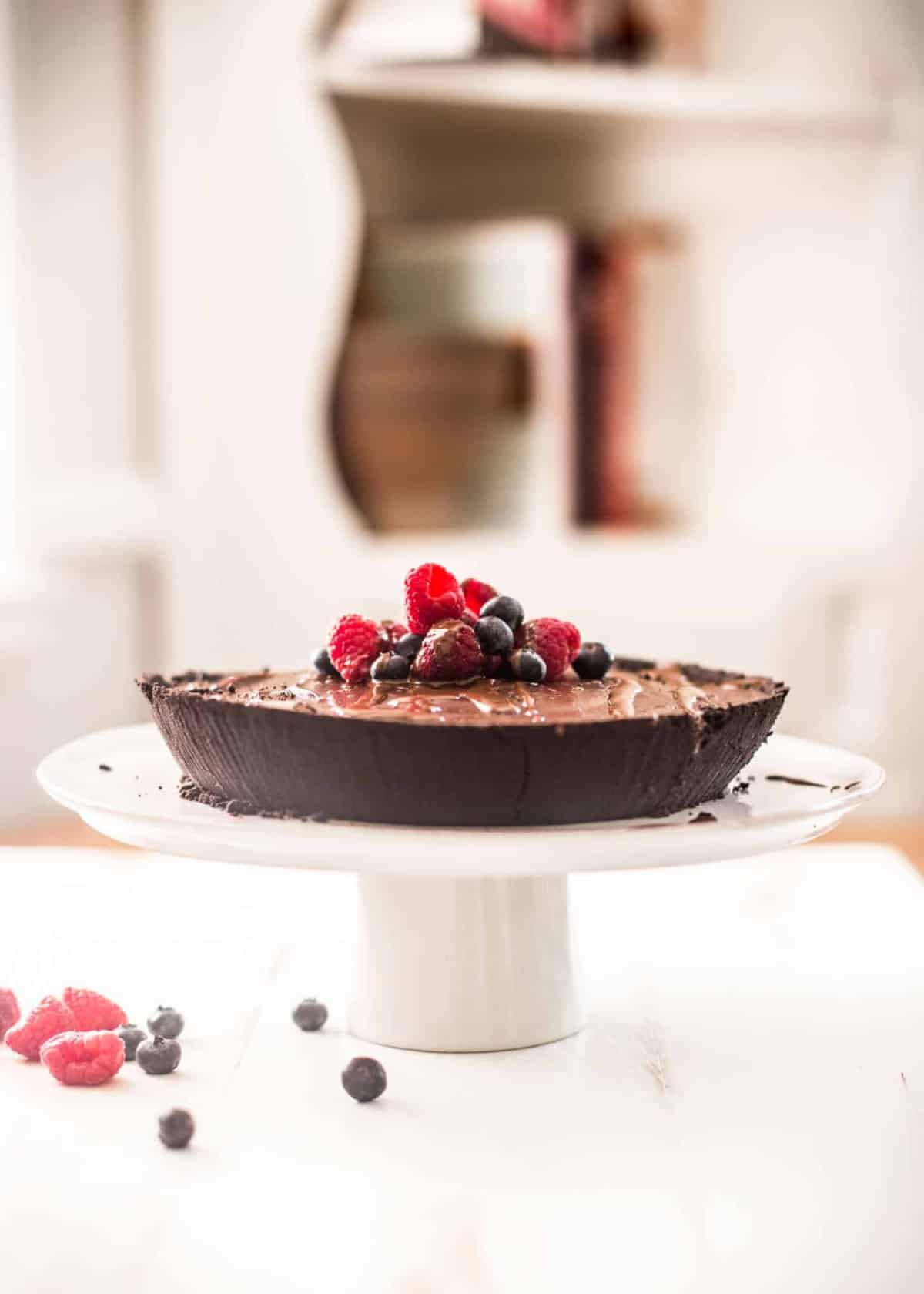 No Bake Double Chocolate Pie on a white dessert stand