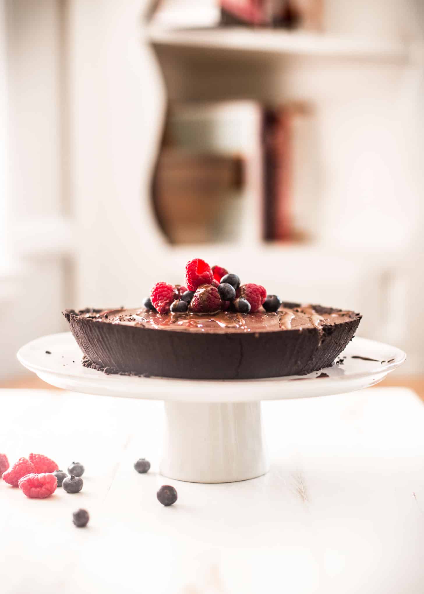 No Bake Double Chocolate Pie on a white dessert stand