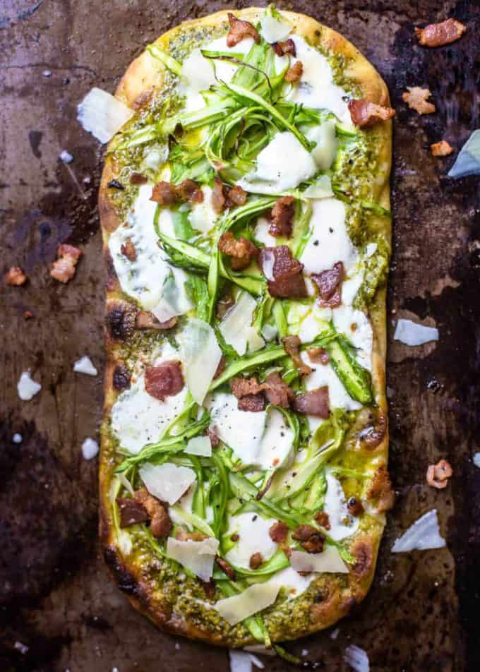 Pesto Flatbread with Shaved Asparagus and Bacon on a sheet pan
