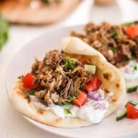 Slow Cooker Pork Gyros on a white plate