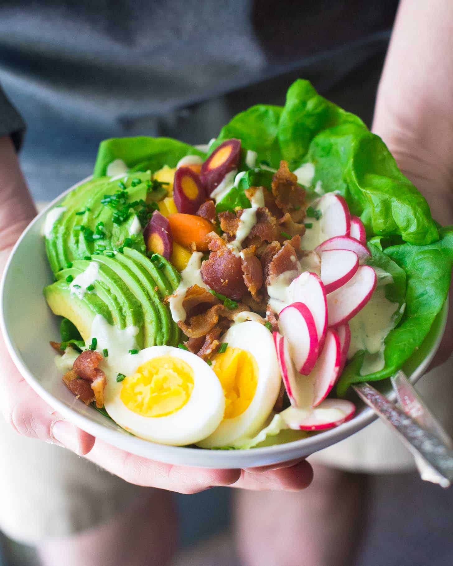 Spring Cobb Salad in a white bowl