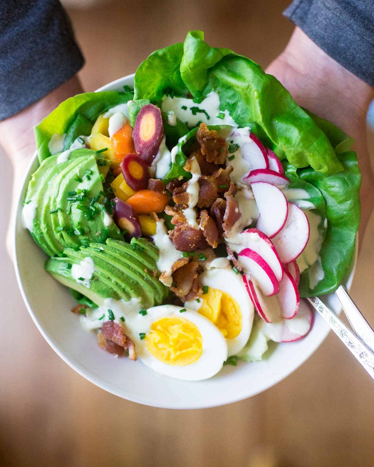 spring cobb salad in white bowl