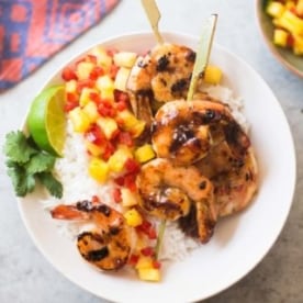 sweet and spicy grilled shrimp on a bed of rice