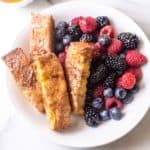 Baked Cinnamon French Toast Sticks in a white bowl