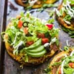 mexican pita pizzas on a sheet pan