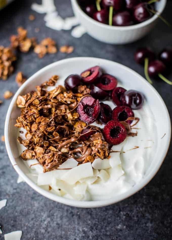 Nutella Granola in a bowl with cherries