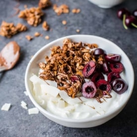 Nutella Granola in a bowl with cherries