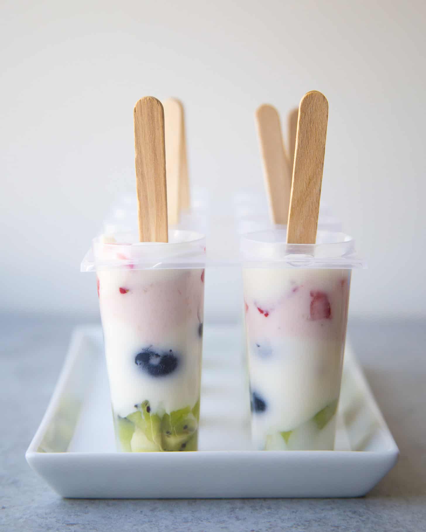 Rainbow Yogurt Popsicles in a mold