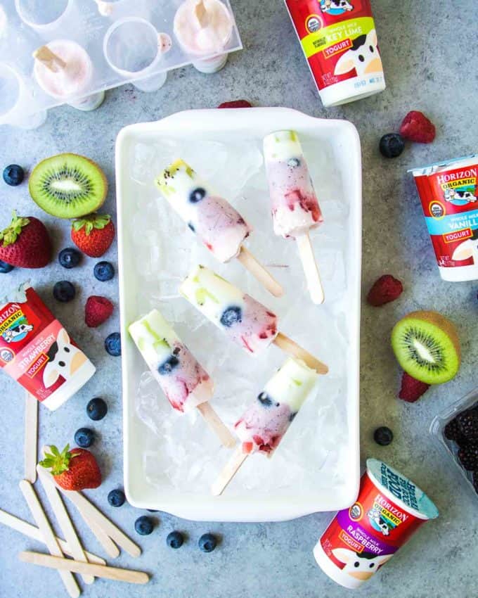 Rainbow Yogurt Popsicles on ice