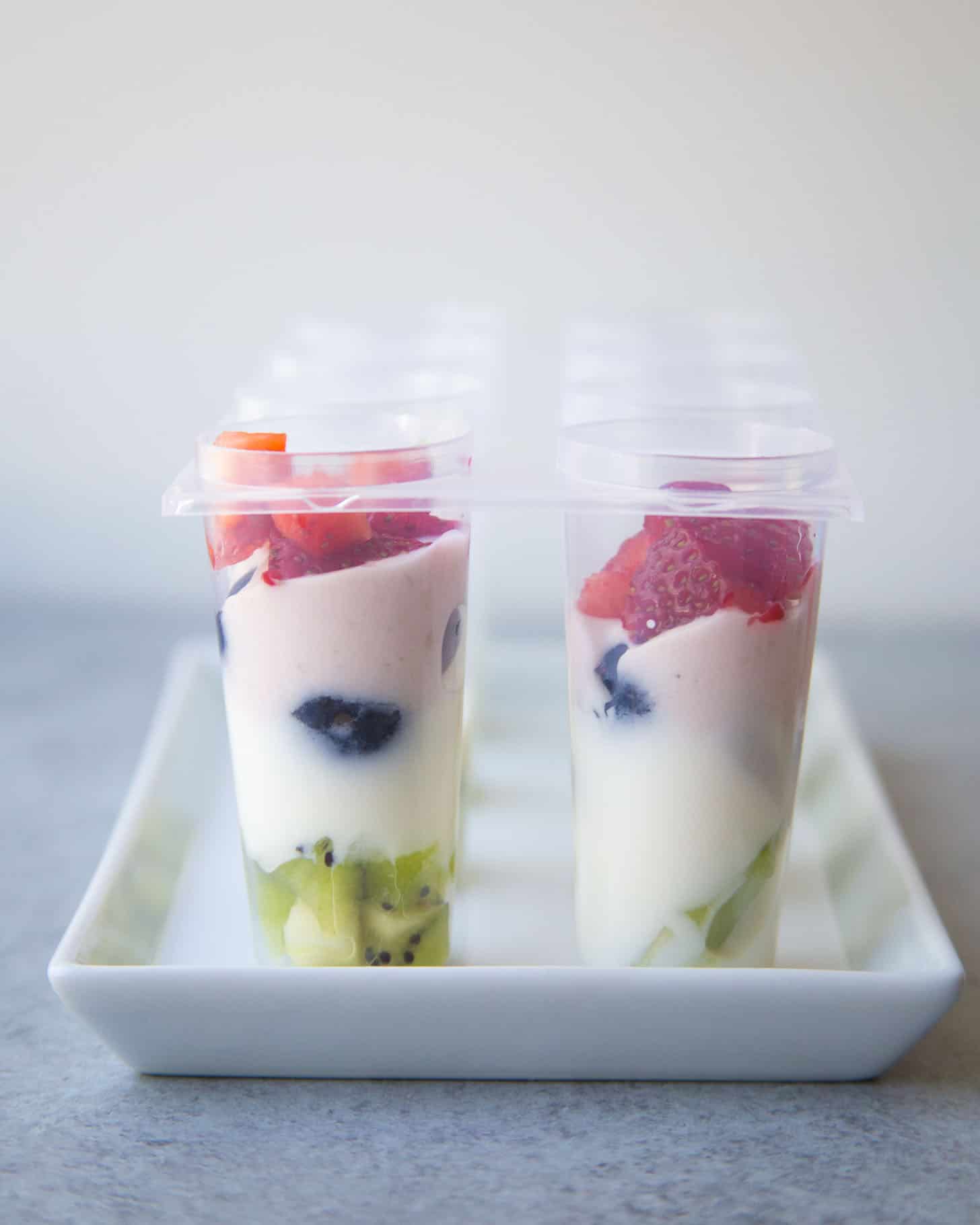 Rainbow Yogurt Popsicles in molds