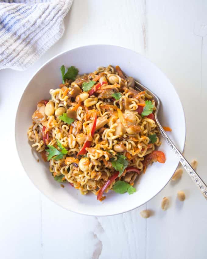 Thai Chicken Peanut Noodles in a white bowl