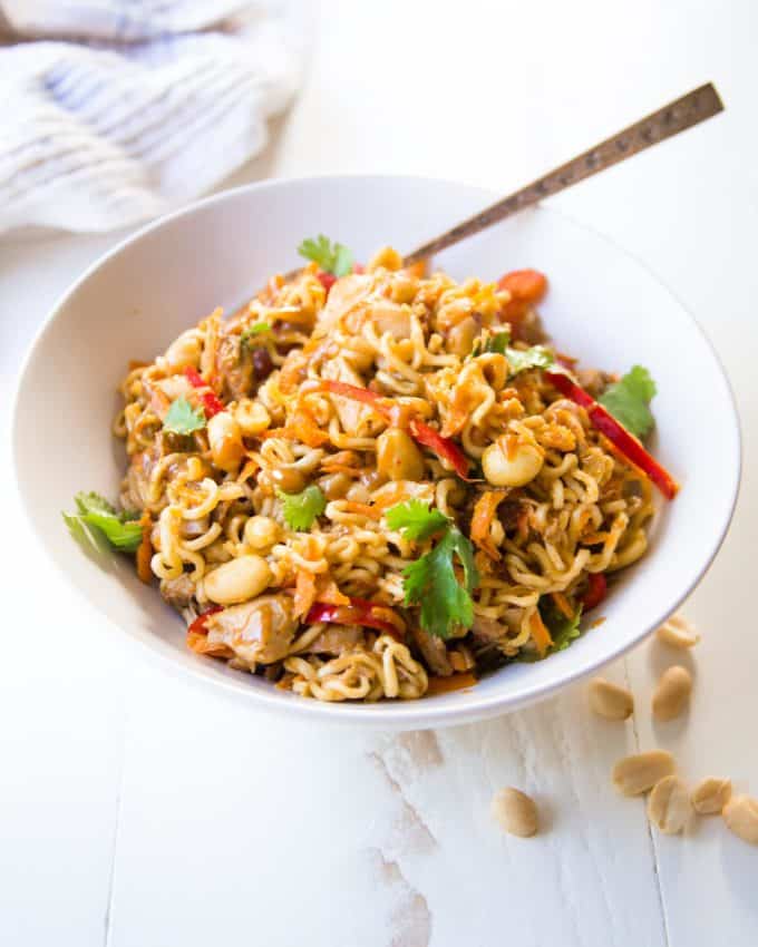 Thai Chicken Peanut Noodles in a white bowl