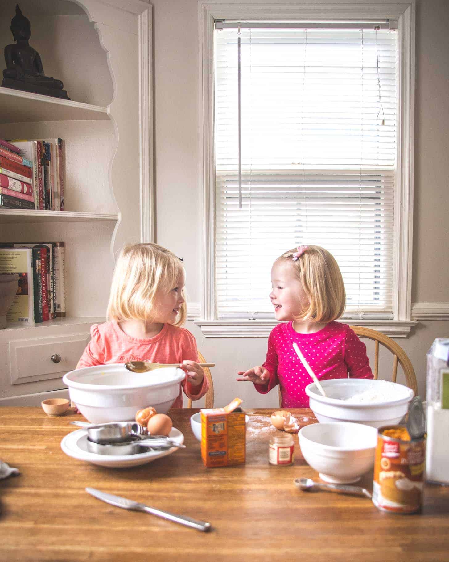 Molly and Clara helping with baking