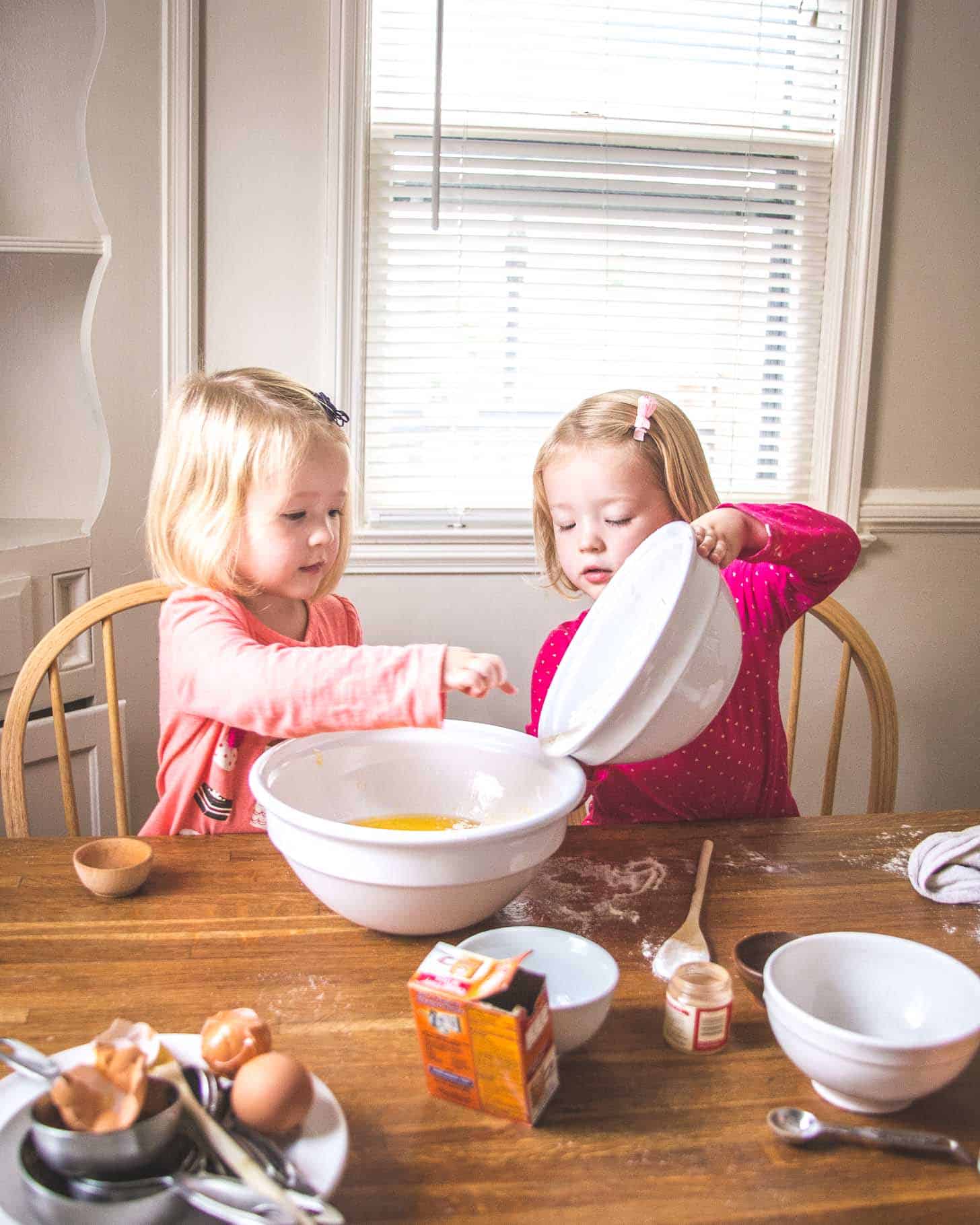 molly and clara baking at the table