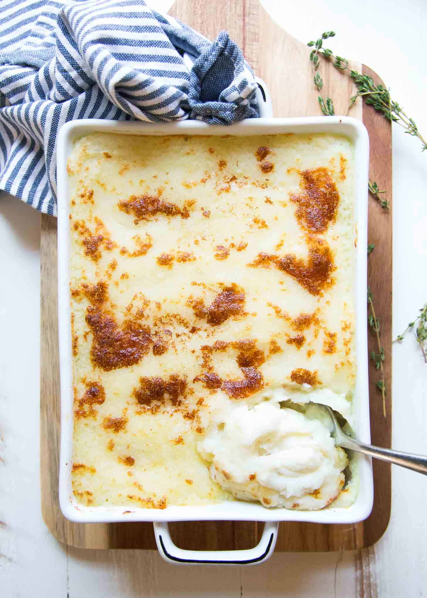 Make Ahead Mashed Potatoes in a white baking dish