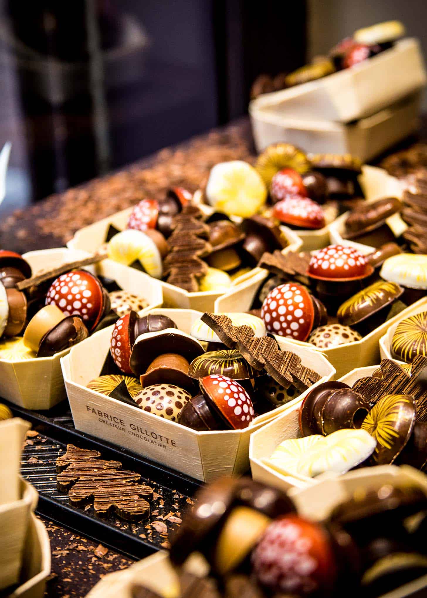 French chocolates in white containers