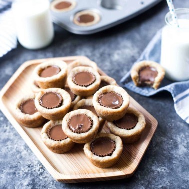 Peanut Butter Cookie Cups on a wooden tray