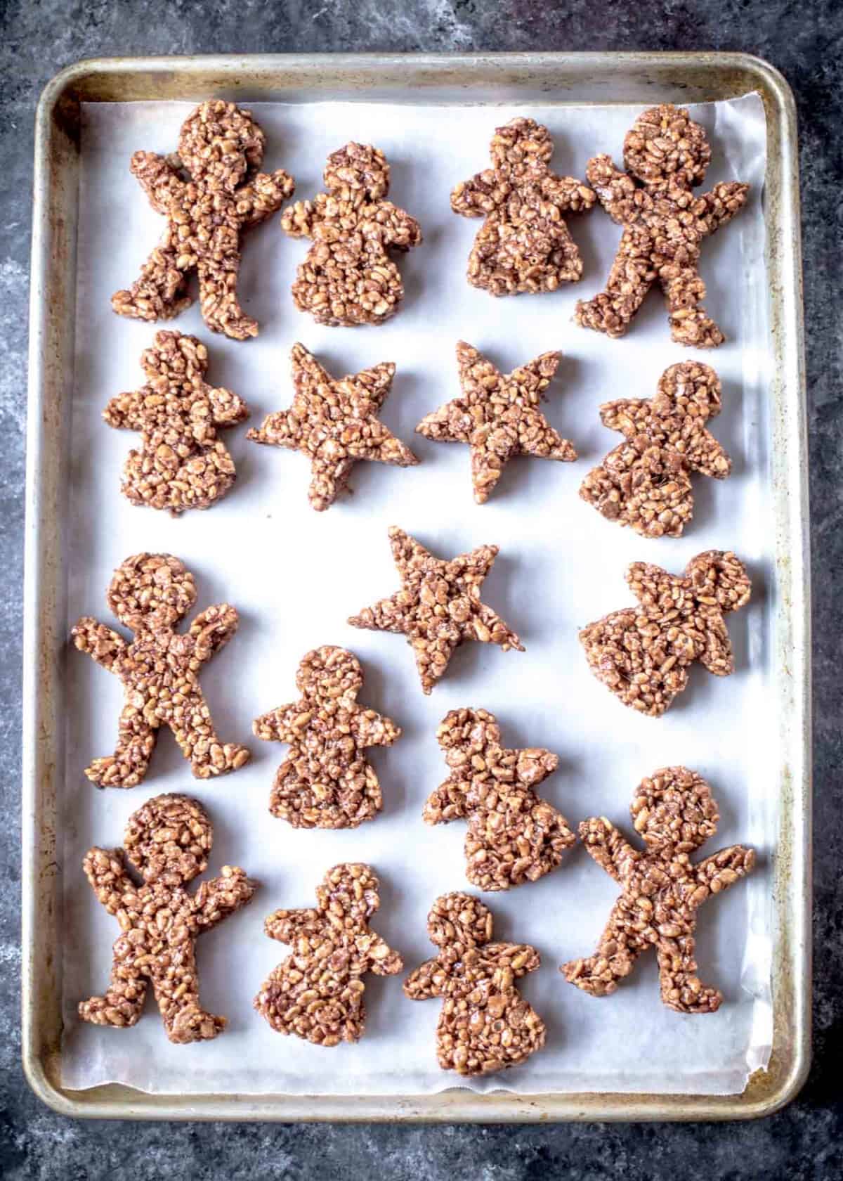 Chocolate Rice Krispies Treats Gingerbread Men shapes on a sheet pan