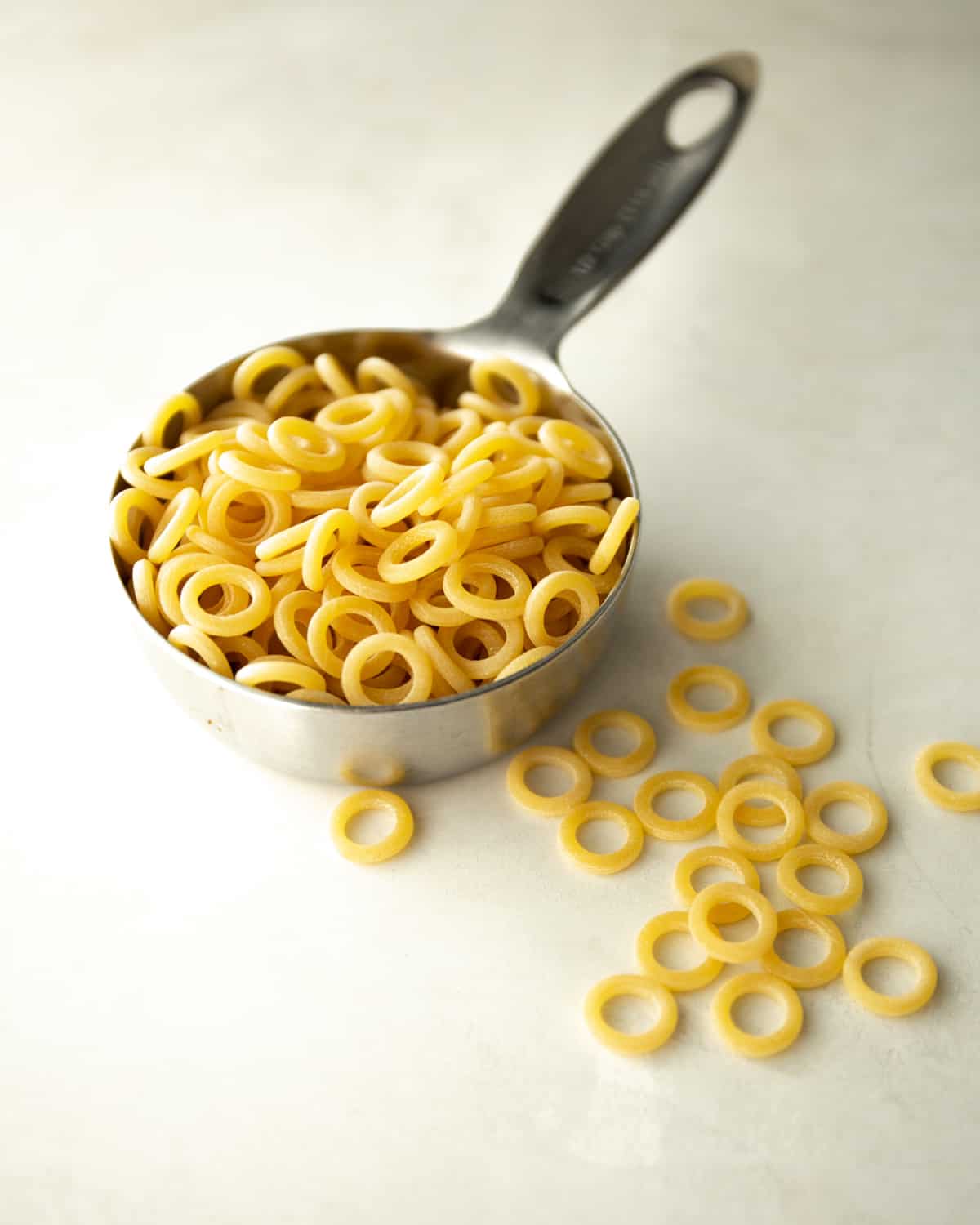 Annelini pasta in a measuring cup