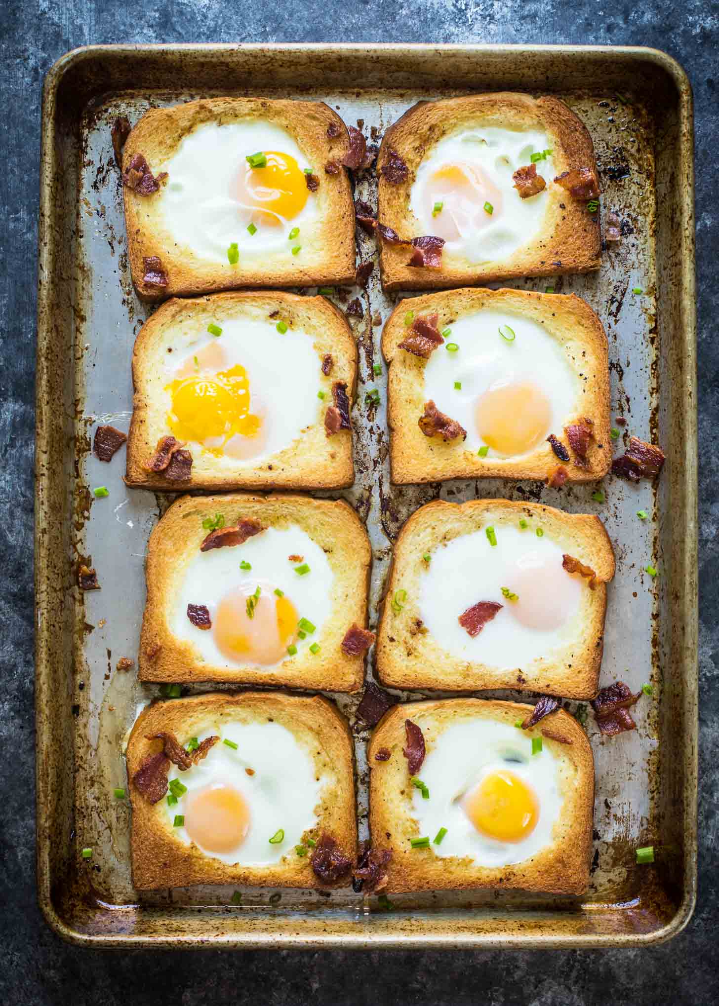 Brioche Baked Egg in a Hole on a sheet pan