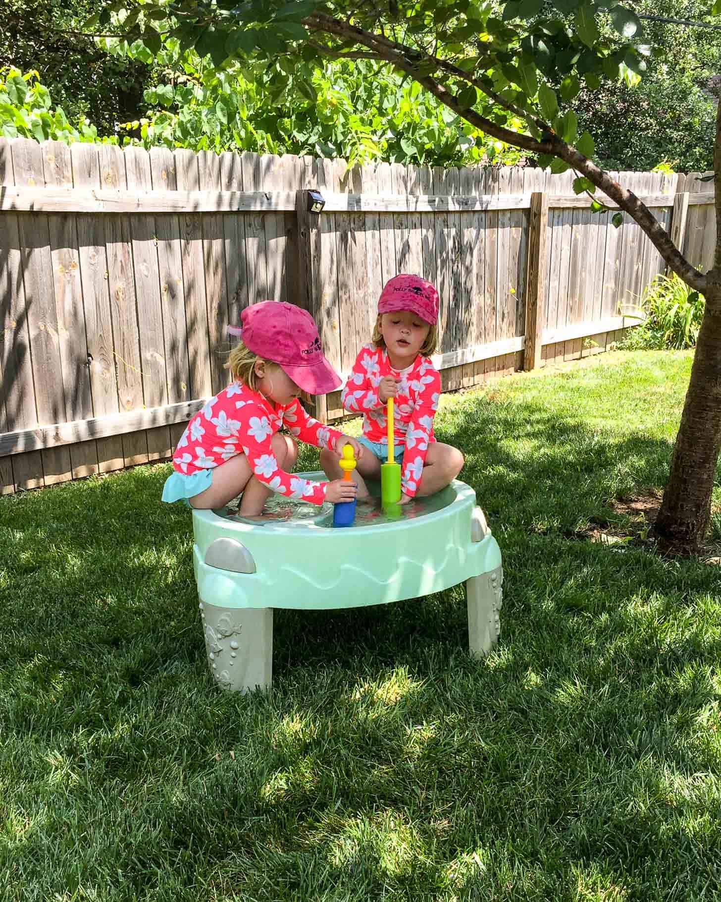 Molly and Clara playing in the Water Table