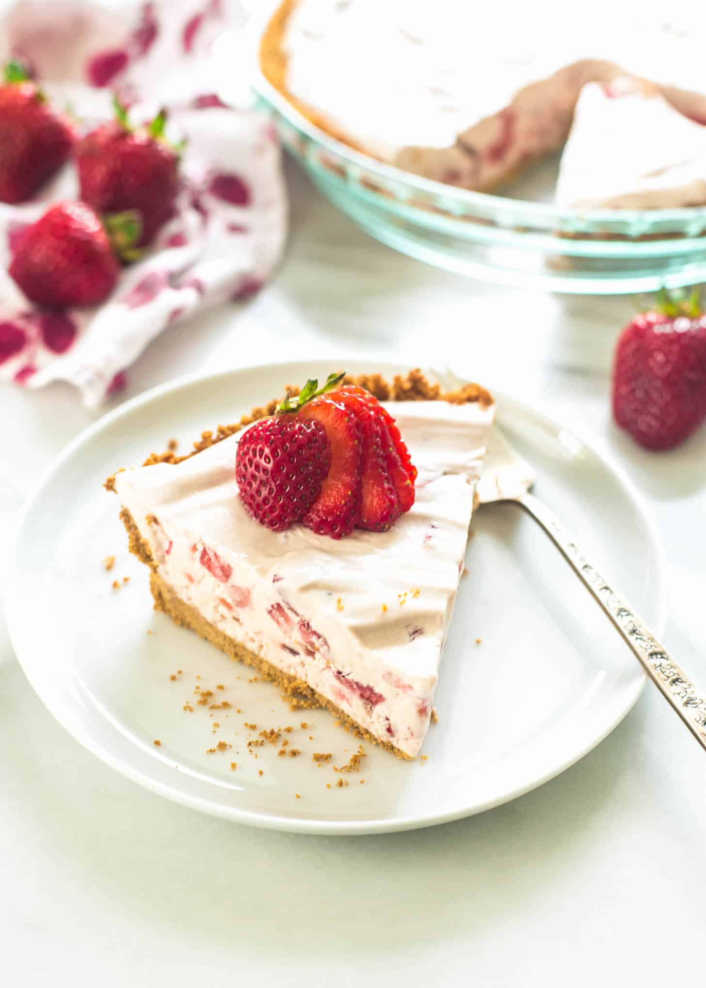 a slice of pie on a white plate with a fork