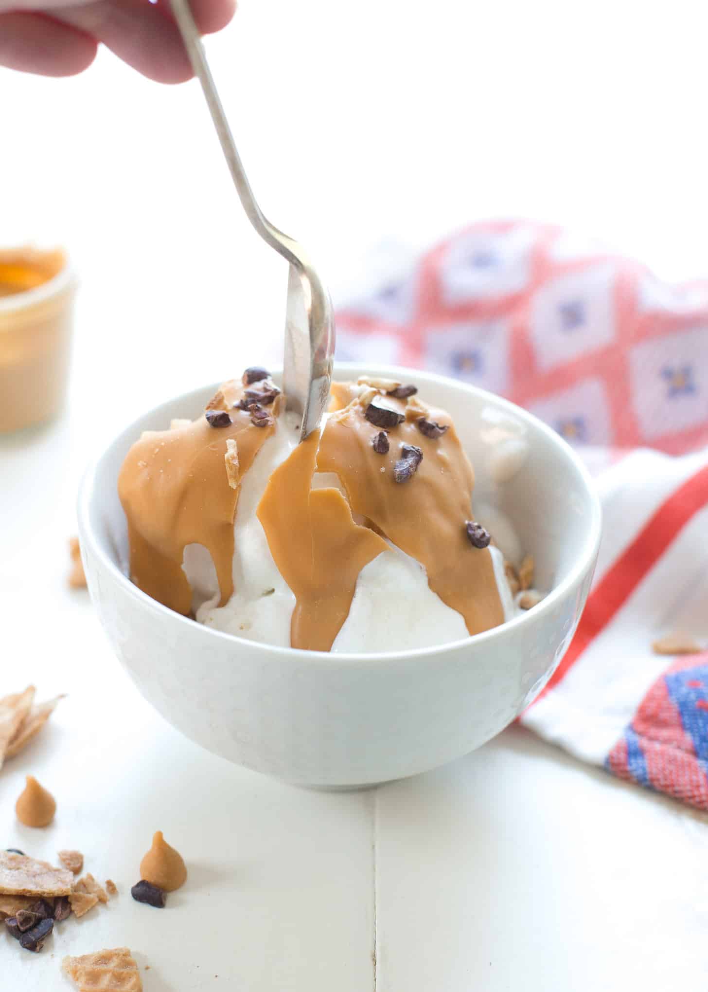 eating ice cream with butterscotch sauce