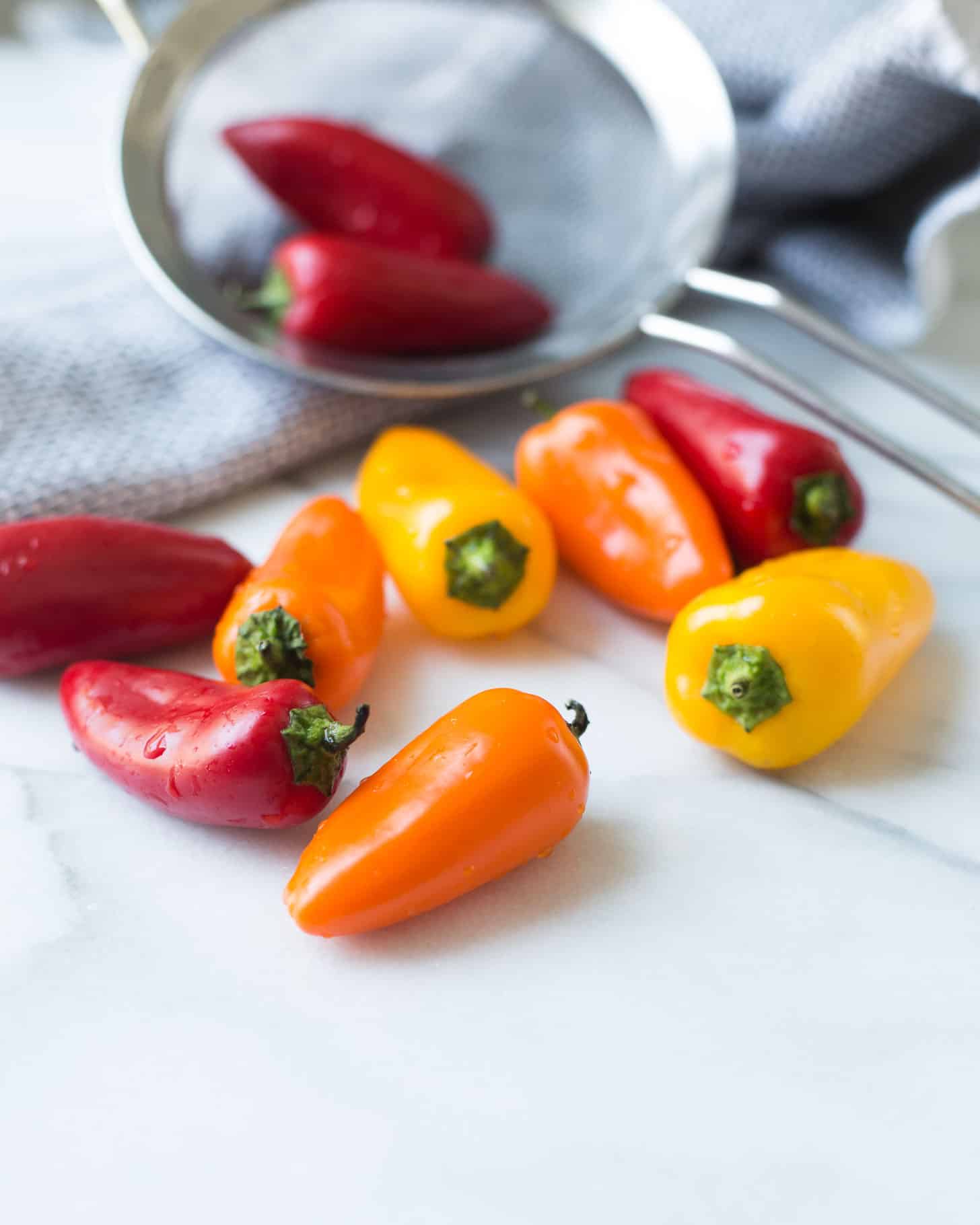 red, yellow and orange sweet peppers